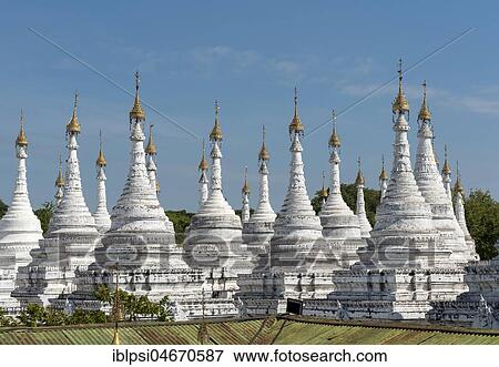 Row of white stupas at Sandamuni Pagoda, Mandalay, Myanmar, Asia View Large Photo Image Stock Photo - Row of white stupas at Sandamuni Pagoda, Mandalay, Myanmar, Asia. Fotosearch