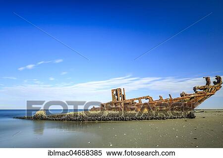 Stock Photography - Rusty shipwreck on the beach, Pelican Point, Skeleton Coast, Erongo region, Namibia, Africa. Fotosearch