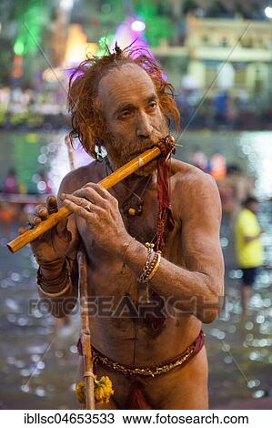 Sadhu plays the flute, Ujjain, Madhya Pradesh, India, Asia View Large Photo Image Stock Image - Sadhu plays the flute, Ujjain, Madhya Pradesh, India, Asia. Fotosearch