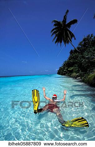Santa Claus with flippers on the beach, Maldives, Asia View Large Photo Image Stock Photo - Santa Claus with flippers on the beach, Maldives, Asia. Fotosearch