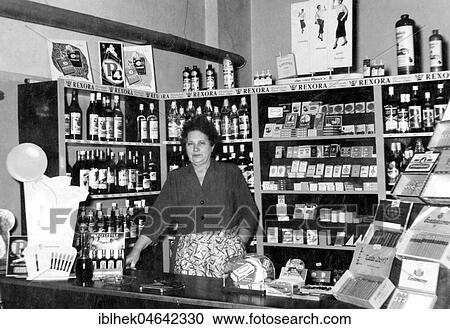 Stock Image - Seller of tobacco and spirits, 1950s, Germany, Europe. Fotosearch