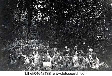 Stock Photo - Seven young women in the meadow, 1930s, exact place unknown, Germany, Europe. Fotosearch
