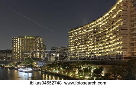 Shangri-La Hotel by night, on the Mae Nam Chao Phraya River, Bang Rak, Bangkok, Thailand, Asia View Large Photo Image Stock Photo - Shangri-La Hotel by night, on the Mae Nam Chao Phraya River, Bang Rak, Bangkok, Thailand, Asia. Fotosearch