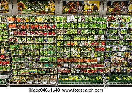 Shelf with different seed packs, garden centre, interior, Bavaria, Germany, Europe View Large Photo Image Stock Photo - Shelf with different seed packs, garden centre, interior, Bavaria, Germany, Europe. Fotosearch