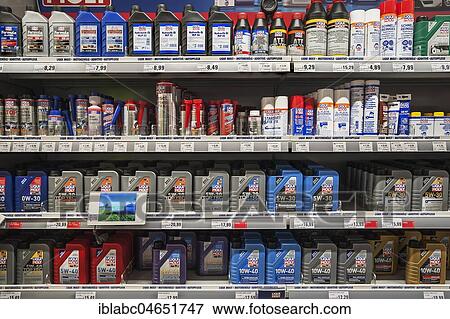 Shelf with engine oil, car care products, hardware store, interior, Bavaria, Germany, Europe View Large Photo Image Stock Photo - Shelf with engine oil, car care products, hardware store, interior, Bavaria, Germany, Europe. Fotosearch