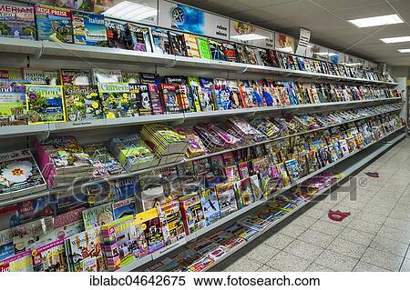 Stock Photography - Shelf with magazines in a supermarket, Germany, Europe. Fotosearch