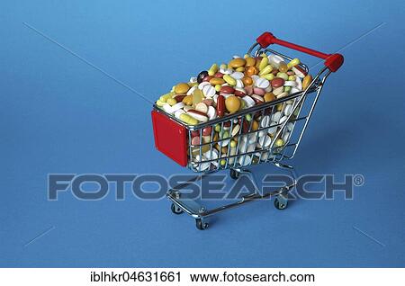 Shopping cart filled with coloured pills, symbol picture for addiction and drug abuse, studio shot View Large Photo Image Stock Image - Shopping cart filled with coloured pills, symbol picture for addiction and drug abuse, studio shot. Fotosearch