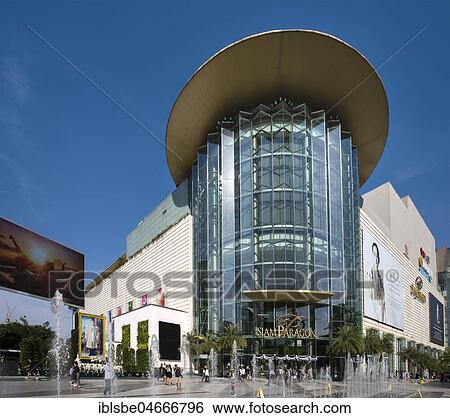 Stock Photograph - Siam Paragon Shopping Centre, exterior view, fountain in front of the glass facade, Rama I Road, Pathum Wan district, Bangkok, Thailand, Asia. Fotosearch