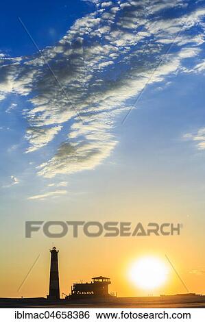 Silhouettes, Lighthouse and Lodge at sunset, Pelican Point, Walvis Bay, Erongo region, Namibia, Africa View Large Photo Image Stock Photograph - Silhouettes, Lighthouse and Lodge at sunset, Pelican Point, Walvis Bay, Erongo region, Namibia, Africa. Fotosearch