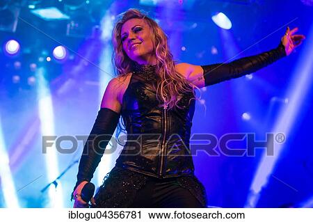 Singer Kobra Paige from the American melodic power metal band Kamelot live in the Schüür Lucerne, Switzerland, Europe View Large Photo Image Stock Image - Singer Kobra Paige from the American melodic power metal band Kamelot live in the Schüür Lucerne, Switzerland, Europe. Fotosearch
