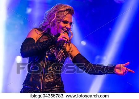 Singer Kobra Paige from the American melodic power metal band Kamelot live in the Schüür Lucerne, Switzerland, Europe View Large Photo Image Stock Image - Singer Kobra Paige from the American melodic power metal band Kamelot live in the Schüür Lucerne, Switzerland, Europe. Fotosearch