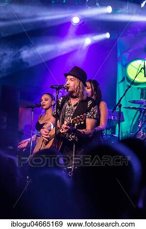 Singer Nic Maeder from the Swiss rock band Gotthard live in the Schüür Luzern, Switzerland, Europe View Large Photo Image Stock Photo - Singer Nic Maeder from the Swiss rock band Gotthard live in the Schüür Luzern, Switzerland, Europe. Fotosearch