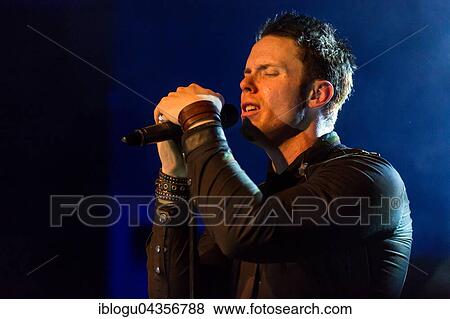 Singer Tommy Karevik, from the American melodic power metal band Kamelot live in the Schüür Lucerne, Switzerland, Europe View Large Photo Image Stock Photo - Singer Tommy Karevik, from the American melodic power metal band Kamelot live in the Schüür Lucerne, Switzerland, Europe. Fotosearch