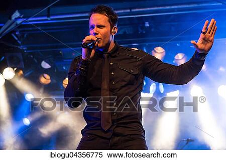 Singer Tommy Karevik from the American melodic power metal band Kamelot live in the Schüür Lucerne, Switzerland, Europe View Large Photo Image Stock Photography - Singer Tommy Karevik from the American melodic power metal band Kamelot live in the Schüür Lucerne, Switzerland, Europe. Fotosearch