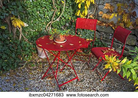 Sitzplatz mit roten Gartenmobeln im Herbst, Mittelfranken, Bayern, Deutschland, Europa View Large Photo Image Stock Image - Sitzplatz mit roten Gartenmobeln im Herbst, Mittelfranken, Bayern, Deutschland, Europa. Fotosearch