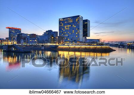 Skyline at Media Harbour, Lido, Colorium building with Innside Hotel, Roggendorf-Haus, Hyatt Rgency Hotel, blue hour, Düsseldorf, North Rhine-Westphalia, Germany, Europe View Large Photo Image Stock Photo - Skyline at Media Harbour, Lido, Colorium building with Innside Hotel, Roggendorf-Haus, Hyatt Rgency Hotel, blue hour, Düsseldorf, North Rhine-Westphalia, Germany, Europe. Fotosearch