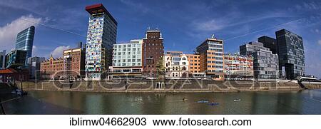 Skyline small transporter with Colorium Building with Innside Hotel, Roggendorf House with Flossi Figures, Düsseldorf, North Rhine-Westphalia, Germany, Europe View Large Photo Image Stock Image - Skyline small transporter with Colorium Building with Innside Hotel, Roggendorf House with Flossi Figures, Düsseldorf, North Rhine-Westphalia, Germany, Europe. Fotosearch