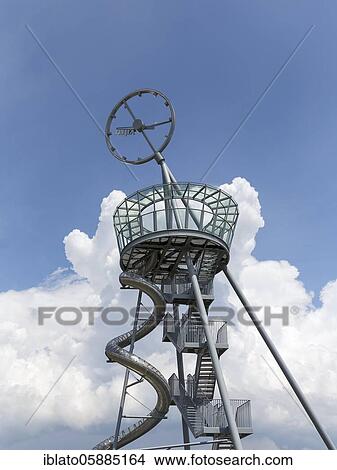 Slide, slide tower Vitra Slide Tower made of steel with viewing platform and large clock, artist Carsten Höller, Vitra Campus, Vitra Design Museum, Weil am Rhein, Baden-Württemberg, Germany, Europe View Large Photo Image Picture - Slide, slide tower Vitra Slide Tower made of steel with viewing platform and large clock, artist Carsten Höller, Vitra Campus, Vitra Design Museum, Weil am Rhein, Baden-Württemberg, Germany, Europe. Fotosearch