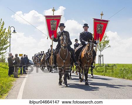 Stock Photo - Sorbian men riding on decorated horses, traditional Easter riding on Easter Sunday, Radibor, Saxony, Germany, Europe. Fotosearch