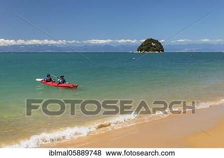 Split Apple Rock at Split Apple Beach, Tasman Bay, Pacific Ocean, Tasman, Abel Tasman National Park, South Island, New Zealand, Oceania View Large Photo Image Stock Photo - Split Apple Rock at Split Apple Beach, Tasman Bay, Pacific Ocean, Tasman, Abel Tasman National Park, South Island, New Zealand, Oceania. Fotosearch