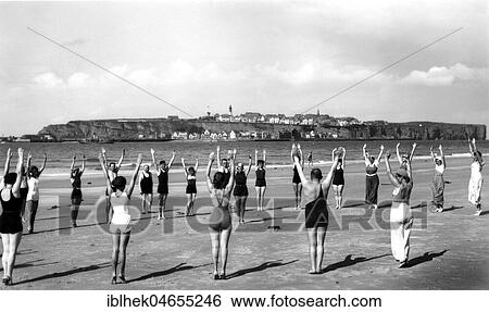 Stock Photograph - Sport, beach gymnastics, 1930s, Helgoland, Germany, Europe. Fotosearch