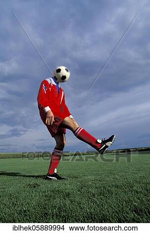 Sports, soccer, ball as head, Berlin, Germany, Europe View Large Photo Image Picture - Sports, soccer, ball as head, Berlin, Germany, Europe. Fotosearch