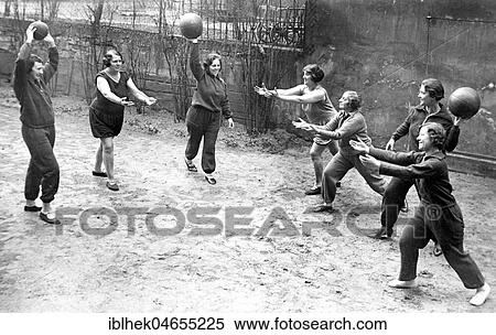 Sports, Women throwing medicine balls, 1930s, exact location unknown, Germany, Europe View Large Photo Image Stock Photography - Sports, Women throwing medicine balls, 1930s, exact location unknown, Germany, Europe. Fotosearch
