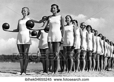Stock Photography - Sports, Women with medicine balls, 1940s, exact location unknown, Germany, Europe. Fotosearch