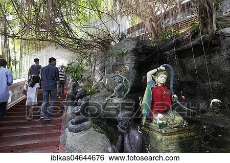 Staircase with God figure, Phu Khan Thong, Golden Mountain, in Wat Saket, district Pom Prap Sattru Phai, Bangkok, Thailand, Asia View Large Photo Image Stock Photograph - Staircase with God figure, Phu Khan Thong, Golden Mountain, in Wat Saket, district Pom Prap Sattru Phai, Bangkok, Thailand, Asia. Fotosearch
