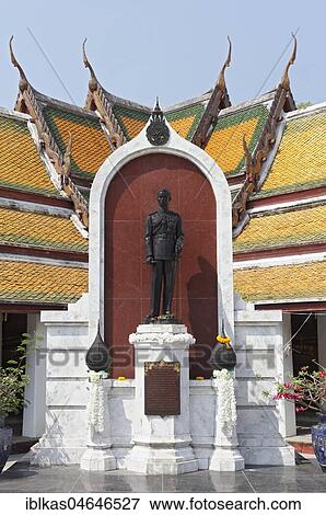 Statue of King Ananda Mahidol, forecourt of Wat Suthat, Royal Temple, Phra Nakhon, Bangkok, Thailand, Asia View Large Photo Image Stock Photo - Statue of King Ananda Mahidol, forecourt of Wat Suthat, Royal Temple, Phra Nakhon, Bangkok, Thailand, Asia. Fotosearch