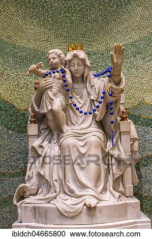 Stock Image - Statue of the Virgin Mary with a child, Mary Queen of the World Cathedral, Marie-Reine-du-Monde Cathedral, Montreal, Quebec, Canada, North America. Fotosearch