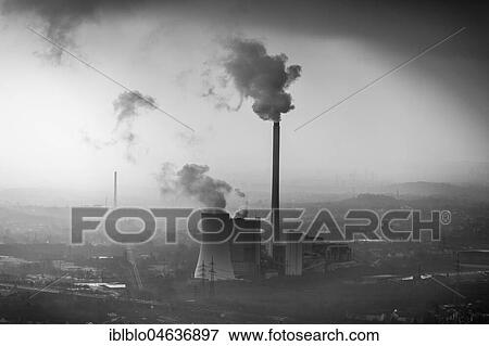 Stock Photo - STEAG heating power plant Herne, coal power station with smoke cloud in the haze in front of industrial backdrop, Herne, Ruhr area, North Rhine-Westphalia, Germany, Europe. Fotosearch