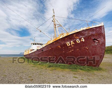 Stock Photo - Stranded old shipwreck on the beach, Gardar BA 64 at road 612, Patreksfjörður Fjord, Patreksfjördur, Vestfirðir, Westfjords, Iceland, Europe. Fotosearch