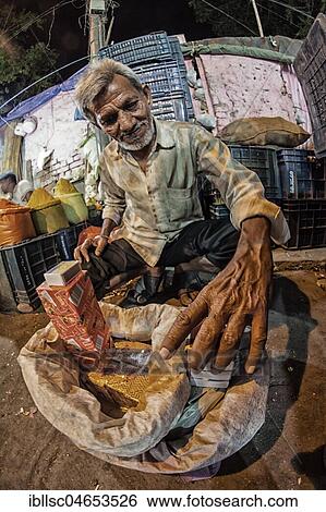 Street vendor for matches at a market, New Delhi, India, Asia View Large Photo Image Stock Photograph - Street vendor for matches at a market, New Delhi, India, Asia. Fotosearch