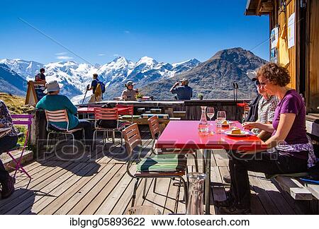 Sun terrace of the Paradise Hut with Piz Palü, Bellavista and Piz Bernina above the Bernina Valley, Pontresina, Bernina Alps, Upper Engadine, Engadine, Grisons, Switzerland, Europe View Large Photo Image Stock Image - Sun terrace of the Paradise Hut with Piz Palü, Bellavista and Piz Bernina above the Bernina Valley, Pontresina, Bernina Alps, Upper Engadine, Engadine, Grisons, Switzerland, Europe. Fotosearch