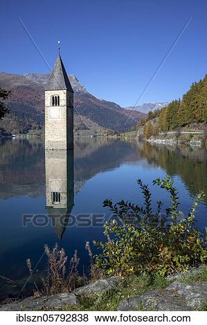 Sunken church tower in the reservoir at the Reschenpass, Graun, Vinschgau, South Tyrol, Italy, Europe View Large Photo Image Stock Photo - Sunken church tower in the reservoir at the Reschenpass, Graun, Vinschgau, South Tyrol, Italy, Europe. Fotosearch