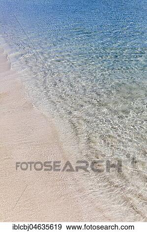 Stock Photo - Surf on a sandy beach, Puglia, Italy, Europe. Fotosearch