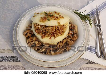 Swabian cuisine, steamed noodles on mushroom ragout served on a plate, Germany, Europe View Large Photo Image Stock Photo - Swabian cuisine, steamed noodles on mushroom ragout served on a plate, Germany, Europe. Fotosearch