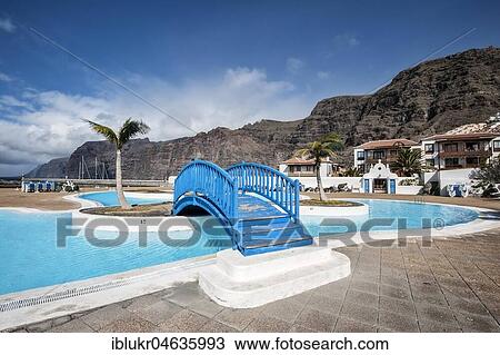 Swimming pool, Piscine Plage Port, in the back Masca Mountains, Los Gigantes, Tenerife, Spain, Europe View Large Photo Image Stock Image - Swimming pool, Piscine Plage Port, in the back Masca Mountains, Los Gigantes, Tenerife, Spain, Europe. Fotosearch
