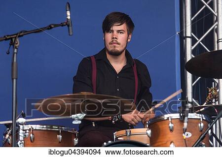 Picture - Swiss Folk Pop Band Serafyn live at the Blue Balls Festival Lucerne, Switzerland Anna Erhard: vocals and guitar Anja Waldkircher: vocals and cello Alexandra Werner: vocals and cello J. J. Lion: drums Lucas Loew: double bass. Fotosearch