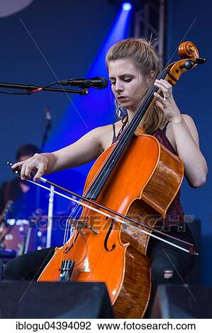 Swiss Folk Pop Band Serafyn live at the Blue Balls Festival Lucerne, Switzerland Anna Erhard: vocals and guitar Anja Waldkircher: vocals and cello Alexandra Werner: vocals and cello J. J. Lion: drums Lucas Loew: double bass View Large Photo Image Stock Image - Swiss Folk Pop Band Serafyn live at the Blue Balls Festival Lucerne, Switzerland Anna Erhard: vocals and guitar Anja Waldkircher: vocals and cello Alexandra Werner: vocals and cello J. J. Lion: drums Lucas Loew: double bass. Fotosearch