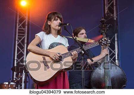 Swiss Folk Pop Band Serafyn live at the Blue Balls Festival Lucerne, Switzerland Anna Erhard: vocals and guitar Anja Waldkircher: vocals and cello Alexandra Werner: vocals and cello J. J. Lion: drums Lucas Loew: double bass View Large Photo Image Stock Photo - Swiss Folk Pop Band Serafyn live at the Blue Balls Festival Lucerne, Switzerland Anna Erhard: vocals and guitar Anja Waldkircher: vocals and cello Alexandra Werner: vocals and cello J. J. Lion: drums Lucas Loew: double bass. Fotosearch