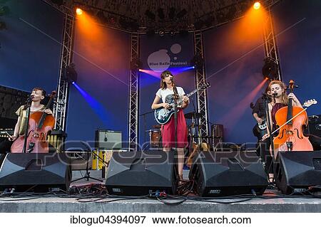 Swiss Folk Pop Band Serafyn live at the Blue Balls Festival Lucerne, Switzerland Anna Erhard: vocals and guitar Anja Waldkircher: vocals and cello Alexandra Werner: vocals and cello J. J. Lion: drums Lucas Loew: double bass View Large Photo Image Stock Photo - Swiss Folk Pop Band Serafyn live at the Blue Balls Festival Lucerne, Switzerland Anna Erhard: vocals and guitar Anja Waldkircher: vocals and cello Alexandra Werner: vocals and cello J. J. Lion: drums Lucas Loew: double bass. Fotosearch
