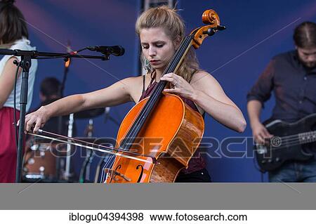 Stock Photo - Swiss Folk Pop Band Serafyn live at the Blue Balls Festival Lucerne, Switzerland Anna Erhard: vocals and guitar Anja Waldkircher: vocals and cello Alexandra Werner: vocals and cello J. J. Lion: drums Lucas Loew: double bass. Fotosearch