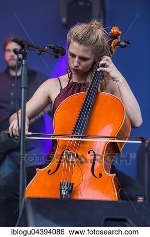 Swiss Folk Pop Band Serafyn live at the Blue Balls Festival Lucerne, Switzerland Anna Erhard: vocals and guitar Anja Waldkircher: vocals and cello Alexandra Werner: vocals and cello J. J. Lion: drums Lucas Loew: double bass View Large Photo Image Stock Photograph - Swiss Folk Pop Band Serafyn live at the Blue Balls Festival Lucerne, Switzerland Anna Erhard: vocals and guitar Anja Waldkircher: vocals and cello Alexandra Werner: vocals and cello J. J. Lion: drums Lucas Loew: double bass. Fotosearch