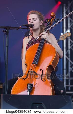 Swiss Folk Pop Band Serafyn live at the Blue Balls Festival Lucerne, Switzerland Anna Erhard: vocals and guitar Anja Waldkircher: vocals and cello Alexandra Werner: vocals and cello J. J. Lion: drums Lucas Loew: double bass View Large Photo Image Stock Photography - Swiss Folk Pop Band Serafyn live at the Blue Balls Festival Lucerne, Switzerland Anna Erhard: vocals and guitar Anja Waldkircher: vocals and cello Alexandra Werner: vocals and cello J. J. Lion: drums Lucas Loew: double bass. Fotosearch