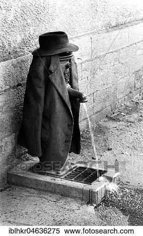 Stock Photography - Tap as clothes rack for jacket and hat, ca. 1970s, exact place unknown, France, Europe. Fotosearch
