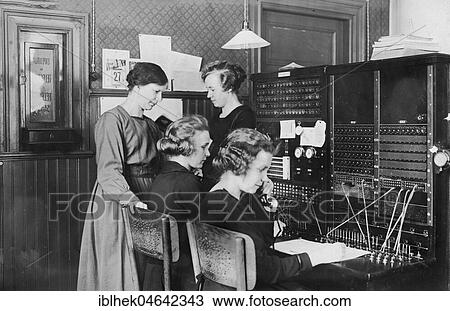 Stock Image - Telephone operators, women working in a switchboard, 1930s, Germany, Europe. Fotosearch