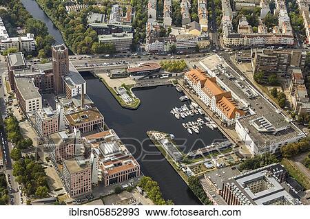 Stock Image - Teltow Canal with Tempelhofer Hafen and Ullsteinhaus, Berlin, Germany, Europe. Fotosearch