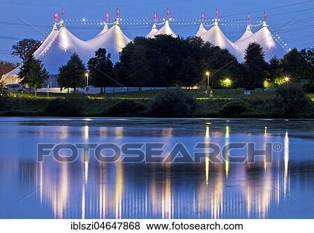 Stock Photo - Tent festival Ruhr at Kemnader See, blue hour, Bochum, Ruhr Area, North Rhine-Westphalia, Germany, Europe. Fotosearch